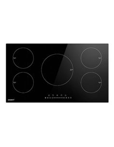 an electric cooktop with four burners on the front and two knobs on the back