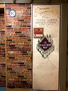 an entrance to the wizard's map in front of a brick wall