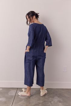 About Prodcut Introducing our Cotton Linen Blend Denim Button-Down Jumpsuit - a versatile and stylish wardrobe staple for any season. Crafted from cotton and linen, this jumpsuit offers the perfect balance of comfort and durability.Designed with a classic button-down front, this jumpsuit exudes a timeless charm while providing a flattering and adjustable fit. Experience the joy of looking effortlessly fashionable while feeling comfortable and confident in this versatile piece. Make a statement w Summer Cotton Denim Jumpsuit For Work, Spring Linen Jumpsuits And Rompers For Work, Daywear Relaxed Fit Overall Jumpsuits And Rompers, Spring Indigo Denim Jumpsuit With Pockets, Casual Linen Jumpsuits And Rompers For Work, Relaxed Fit Overall Jumpsuits And Rompers For Daywear, Relaxed Fit Overalls For Daywear, Summer Workwear Dark Wash Jumpsuits And Rompers, Dark Wash Cotton Jumpsuit For Work