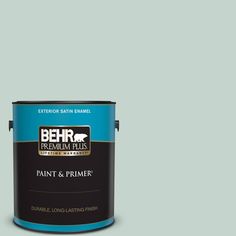 a green paint with the words behr premium plus ultra on it's side