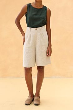 The linen loose-fitted knee-length shorts offer a comfortable and casual fit, perfect for warm days. Handcrafted in our studio to your measurements and preferences, available in over 60 colors. DETAILS - 100 % linen, medium weight (200gsm), free-shrinkage, amazingly soft feel - Knee-length shorts; different length is possible - Loose fit - High waisted - Pleated front - Front button and zipper - Inseam pockets - Custom made pants, FREE customizations; simply let us know your needs (hem length, fit style, leg opening width, belt, etc.). - Handcrafted in our studio, French seams, clean and meticulous COLOR - The color shown is Beige. - Available in over 60 colors, choose color in the color chart in the listing. - Link of fabric samples available here: https://madebygaiavn.etsy.com/listing/13 Summer Wide Leg Shorts With Built-in Shorts, Linen Bermuda Shorts With Built-in Shorts And Relaxed Fit, Beige Bermuda Shorts For Beach, Casual Knee-length Culottes For Spring, Summer Linen Bermuda Shorts For Vacation, Relaxed Fit Flax Bottoms For Summer, Beige Linen Shorts For The Beach, Relaxed Fit Bermuda Shorts With Pockets For Vacation, Summer Relaxed Fit Flax Bottoms