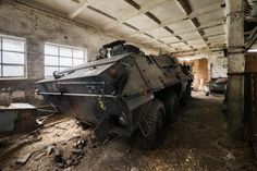 This abandoned OT-64 SKOT Armoured Personal Carrier, manufactured during the Cold War, now lies hidden in an old barn in Poland. Armoured Personnel Carrier, Old Barn