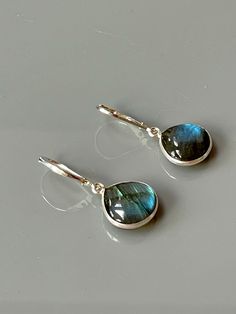 Gorgeous smooth Labradorite briolettes are set in sterling silver and hang from sterling silver leverbacks. Labradorite drops are approx 14mm long. Simple, elegant earrings. I lovingly handcraft all jewelry and hair accessories one at a time in my northern Michigan studio. Gemstones are naturally formed so please expect some slight variations in color and inclusions between stones. Each pair will be hand picked to match. **Orders come presented in a lovely box ready for gifting and US orders ove Labradorite Teardrop Earrings As Gift, Labradorite Teardrop Earrings For Gift, Elegant Labradorite Dangle Earrings, Elegant Labradorite Earrings For Everyday Wear, Elegant Nickel-free Labradorite Earrings, Elegant Labradorite Drop Jewelry, Elegant Drop Labradorite Jewelry, Elegant Everyday Labradorite Earrings, Silver Minimalist Earrings With Natural Stones