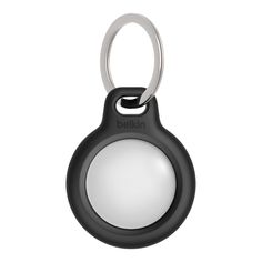 a black and white keychain with a light on the top of it's handle