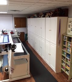 a kitchen with lots of cabinets and counters