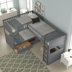 a bedroom with two bunk beds and a rug on the floor