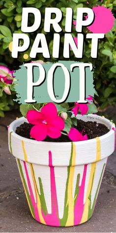 a flower pot with pink flowers in it and the words drip paint pot above it