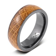 a wedding ring with a wooden inlay and a cross on the inside of it