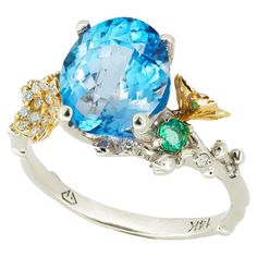 Topaz cocktail ring. Sky blue Topaz 14k gold ring. Topaz statement gold ring. Oval Topaz ring. Topaz and diamonds ring. Flower gold ring. Metal: 14k gold : yellow and white. Weight: 3.85 gr depends from size. Central stone natural Topaz Weight: approx 4.5 ct Cut: oval Color: sky blue Clarity: VVS. Diamonds: 0.23 ct (0.01x23), G/Vs, round brilliant cut. Emerald: green color, transparent clarity, round cut, 1 piece, 0.08 ct Sapphire: blue color, transparent clarity, round cut, 1 piece, 0.08 ct oct Flower Gold Ring, Statement Gold Ring, Topaz Cocktail Ring, Sky Blue Topaz Ring, November Birthstone Ring, Topaz Birthstone, Vvs Diamond, Gold Topaz, Ring Flower