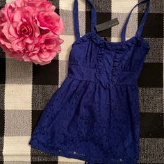 New With Tags. Lace. Side Zipper. 2 Layers. Looks Great With White Jeans. Blue Spaghetti Strap Top With Ruffles, Blue Ruffled Top With Spaghetti Straps, Blue Ruffled Spaghetti Strap Top, Lace Side, Lace Babydoll, Babydoll Top, The Limited, Blue Lace, Deep Blue