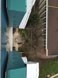 an aerial view of a building and trees