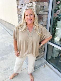 Step into comfort and style with our Retreat Yourself Tunic Top. Featuring a trendy V-neck and loose, short sleeves, this oversize tunic top is perfect for a day of relaxation or a night out. Embrace the freedom and embrace yourself with this must-have addition to your wardrobe! V-Neckline Short Sleeve Oversized Tunic Crystal is wearing a size large! Esme is wearing a size small! Relaxed Fit V-neck Top For Summer Loungewear, Chic Relaxed Fit V-neck Top For Day Out, Relaxed V-neck Blouse For Day Out, Chic Relaxed Fit V-neck Top For Summer, Spring Relaxed Fit V-neck Top For Day Out, Spring V-neck Top For Day Out With Relaxed Fit, Spring V-neck Top For Day Out, Relaxed V-neck Blouse For Vacation, Relaxed Fit V-neck Blouse For Day Out