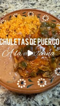 a plate with rice, beans and other food on it that says chiletas de puerto