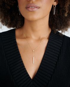 Our 18k adjustable diamond lariat necklace features 0.35ct carat of delicately set diamonds. Wear this piece long or shorten up to a choker length. We love this piece for everyday layering magic! 18k Yellow Gold, White Gold, Rose Gold 0.35ct total weight Adjustable 22" longest length, 14" shortest length The diamond bar drop is 1.5" from the diamond bezel Full cut, clear, round brilliant cut diamonds Benefits of Solid 18k Gold Jewelry Most loved for its durability and longevity Can be worn daily Elegant Long Drop Lariat Necklace For Everyday, Minimalist Necklaces With Single Cut Diamonds, Single Cut Diamond Lariat Necklaces, Minimalist Gold Diamond Lariat Necklace, Gift Lariat Diamond Necklace With Single Cut Diamonds, Fine Jewelry Lariat Necklace With Single Cut Diamonds, Minimalist Diamond Lariat Necklace For Gifts, Minimalist Lariat Diamond Necklace For Gift, Minimalist Lariat Diamond Necklace As Gift