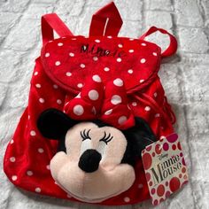 Nwt Minnie Mouse Soft Backpack So Cute. Would Make For A Great Gift. Easy For Little Ones To Carry Or Use As A Diaper Bag. Draw String Closure. Soft Minnie Mouse Head On The Front With Her Signature Bow. Comes From Clean, Smoke-Free Home What A Great Gift Idea. Cute Red Backpack For School, Cute Red School Backpack, Red Character Bag For School, Cute Red Backpack With Adjustable Strap, Cute Mickey Mouse Bags As Gift, Cute Mickey Mouse Bags For Gifts, Cute Minnie Mouse Backpack For School, Casual Red Mickey Mouse Backpack, Minnie Mouse Standard Backpack For Travel