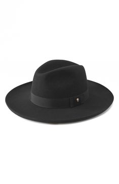 A flat, slightly upturned brim enhances the chic look of this merino wool–felt fedora that complements both casual and more polished looks. Interior size adjuster Merino wool Dry clean Made in Spain Classic Wide Brim Hats For Workwear, Classic Wide Brim Workwear Hat, Classic Wide Brim Work Hats, Flat Brim Fur Felt Hat, Classic Brimmed Workwear Hats, Classic Short Brim Hat For Workwear, Luxury Brimmed Fedora For Fall, Luxury Wool Fedora With Flat Brim, Chic Wool Fedora With Flat Brim