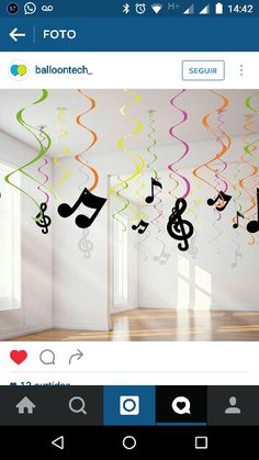 a room with musical notes hanging from the ceiling