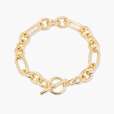 Feel beautiful wearing our Monroe Toggle Bracelet, crafted from a luxe link chain with an easy toggle closure. Dare to stand out wearing the perfect balance of contemporary and classic style in gold. Make the Monroe Toggle Bracelet your signature accessory and be surprised by the endless compliments you receive. Dare to shine with Monroe. Available in 14k gold plated brass 7" link chain 1/2" toggle closure SKU: BYB1171 Chic Everyday Toggle Link Necklace, Chic Everyday Link Toggle Necklace, Chic Jewelry With Toggle Clasp And Link Shape, Chic Gold-tone Link Chain Bracelet, Chic Gold-tone Bracelet With Rectangular Links, Chic Jewelry With Toggle Clasp And Chain Link, Chic Chain Link Jewelry With Toggle Clasp, Trendy Gold-tone Oval Link Chain Bracelet, Chic Gold-tone Oval Link Chain Bracelet