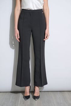 Fall in love with the season 's must have Wide Leg Pant. It features a mid-rise waist, fly front closure and fluid pin tuck details. Designed with a flattering flare at the hem, it 's perfect worn as a suit with its matching single button blazer or as a separate - this pant is the must have addition to your wardrobe. T-Tahari Wide Leg Pintuck Fit & Flare Pant Runs true to size. Model is 5'9" and wearing size 2 Dry Clean Only Imported Style #: THF41043 Flare Pant, Single Button Blazer, Wide Leg Pant, Blazer Buttons, Pair Of Pants, Pin Tucks, Global Fashion, Flare Pants, Fit & Flare