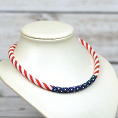 This unique patriotic necklace in the colors of the American flag will be relevant on Independence Day. This necklace is made of highest quality Japanese Toho beads. Diameter 0.3 inch. (0.7 cm).  Delivery time depends on the distance of your country and customs work.Usually delivery is 6 to 20 daysThis is not a guaranteed time, this time, by which we can hope. At different times of the year, delivery can be faster or slower. Please note, shipping time may vary depending on your location and cust Patriotic White Jewelry With Colorful Beads, Patriotic American Flag Jewelry For Independence Day, Patriotic White Jewelry For 4th Of July, Patriotic Round Beads Necklace As Gift, American Flag Jewelry For Independence Day Gift, Patriotic Round Beads Necklace Gift, Patriotic Round Beads Jewelry Gift, Red Patriotic Necklace For 4th Of July, Patriotic Jewelry With Colorful Beads As Gift