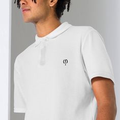 Classic and made to last, this Unisex Pique Polo Shirt is for all occasions. It's crafted from a durable cotton pique fabric. The relaxed and flattering fit is designed to complement any body type. With a classic cut and crisp collar, it can be dressed up or down for sporty, casual, or more formal styles.  * 100% ring-spun cotton * Fabric weight: 5.2 oz/yd² (176 g/m²) * Semi-fitted * Side-seamed construction * Placket with dyed-to-match buttons * The fabric is OEKO-TEX Standard 100 certified Thi Basic Summer Polo Shirt, Cotton Short Sleeve Polo Shirt For Streetwear, Basic Collared Cotton T-shirt, White Cotton Polo Shirt With Polo Collar, Fitted Cotton Polo Shirt Short Sleeve, Fitted Cotton Polo Shirt With Short Sleeves, Classic White Cotton Polo Shirt, Basic Short Sleeve Cotton Polo Shirt, Basic Cotton Short Sleeve Polo Shirt