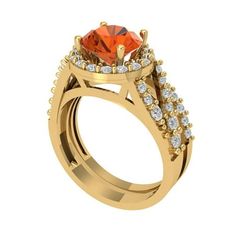 a yellow gold engagement ring with an orange topazte and white diamonds on the sides