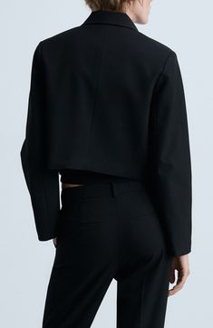 Bold yet minimalist, this menswear-inspired jacket is made from stretchy suiting fabric and cropped to create a contemporary shape. Front button closure Point collar Chest patch pockets Lined 66% polyester, 30% viscose, 4% elastane Spot clean Imported Modern Tailored Cropped Jacket For Business, Modern Structured Cropped Jacket, Modern Cropped Outerwear For Office, Modern Tailored Cropped Jacket For Business Casual, Cropped Office Blazer With Pockets, Modern Cropped Jacket For Office, Tailored Black Cropped Jacket For Work, Black Tailored Cropped Jacket For Work, Tailored Cropped Outerwear For Office