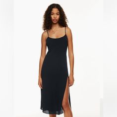 This Is A Midi Slip Dress With A Thigh Slit, Smocked Back Panel And Adjustable Straps. It’s Made With Drapey, Pebbled Crepe Fabric. Size 2 With Side Zip But Can Be Sized Up Or Down Because Of The Smocked Back. If I Won The Lottery, I Won The Lottery, Slip Midi Dress, Won The Lottery, Aritzia Dress, Tie Front Dress, Midi Wrap Dress, Midi Slip Dress, Clothes Wishlist