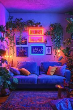 a living room filled with furniture and lots of plants