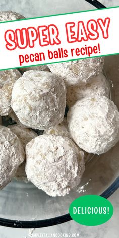 a glass bowl filled with powdered sugar covered donuts next to a sign that says super easy pecan balls recipe