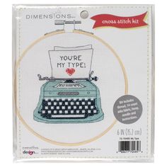 a cross stitch kit with an old typewriter and the words you're my type