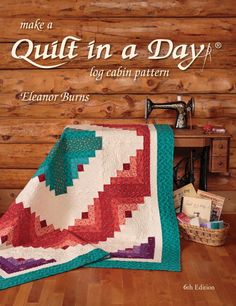 the cover of make a quilt in a day, featuring an image of a blanket