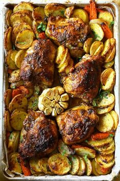 chicken, potatoes and carrots in a casserole dish