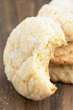 three sugar cookies are stacked on top of each other with one cookie in the middle