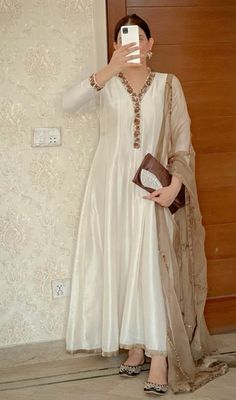 #trendy #trending #suit #style #fashion #instagram #inspiration Wedding Guest Salwar Kameez, White Colour Frock Design, Silk Frock Designs Pakistani, White Anarkali Dress Simple, Simple Cotton Dress Pattern Indian, Kurti Anarkali, Exclusive Gowns, Suit Styles, Trendy Outfits Indian