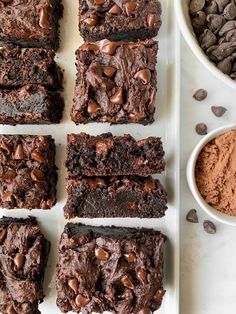 chocolate brownies and cocoa chips on a white tray