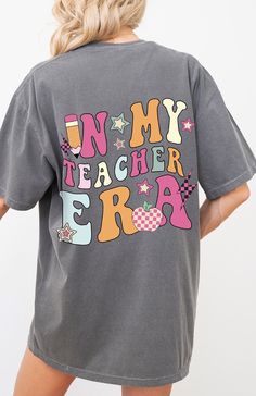 Comfort Colors® Kindergarten Teacher Shirts | Kindergarten Shirt | Elementary School | First Day of Kindergarten | Kindergarten Teacher Team Tee 🍎 Perfect for Teachers: Our Comfort Colors® Kindergarten Teacher Shirts are designed especially for kindergarten teachers. Celebrate your passion for teaching with these stylish and comfortable tees. 🏫 School Spirit: Ideal for showing school spirit, these shirts are perfect for elementary school teachers who want to unite and inspire their students. ? School Spirit Shirt With Graphic Print, School Spirit Graphic Print Relaxed Shirt, School Spirit Graphic Print Relaxed Fit Shirt, Multicolor Letter Print Tops With Relaxed Fit, School Spirit Cotton Shirt With Graphic Print, Cotton School Spirit Shirt With Graphic Print, Retro Gray T-shirt With Letter Print, Retro Gray Graphic Print Top, Retro Gray Top With Graphic Print