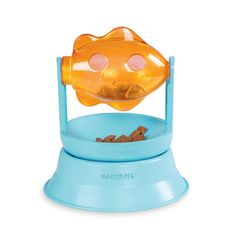 an orange toy fish in a blue bowl