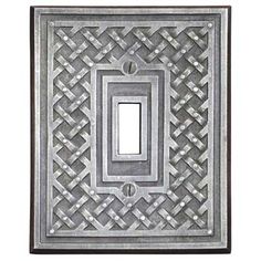 a decorative light switch cover with an intricate design