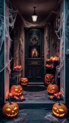 halloween pumpkins in front of an entrance