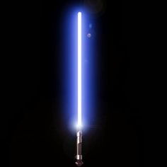 a blue light saber is lit up in the dark