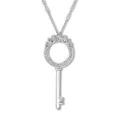 From luxury shoe designer Emmy Scarterfield comes The Emmy London Collection, designed exclusively for Kay Jewelers. Each sparkling piece is meant to inspire women to dream big, work hard, and always look fabulous. This darling key necklace is decorated with shimmering round diamonds and loops of sterling silver inspired by Emmy London shoe designs. A baguette diamond completes the look. The sterling silver pendant has a total diamond weight of 1/10 carat and suspends from a twisted curb chain. Symbol Jewelry, Dream Big Work Hard, Shoe Designs, Silver Ring Designs, Jewelry Advice, Symbolic Jewelry, Diamond Jewelry Designs, Kay Jewelers, Key Necklace