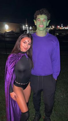 a man and woman dressed up as the hulk and spider - man pose for a photo