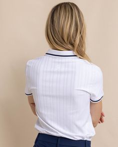 Polish up your wardrobe with the Shaylyn Active Polo. This short-sleeve top features contrasting line detailing on the ribbed collar and cuffs. The invisible zipper adds to the streamlined silhouette, and the flattering style ensures you look your best on the course. Move in comfort with the stretch-infused material of this versatile polo. Pair with our Chapel Performance Pant to complete the look. Style: 11190 Father Son Outfits, Womens Matching Sets, Classic White Dress, Polo Classic, Boys Swim Trunks, Boys Swim, The Invisible, Kids Pants, Swimwear Cover