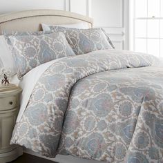 the comforter is neatly made and ready to be used in any room or bed