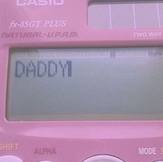 a pink digital calculator with the word daddy written on it's display