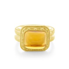 This 18kt yellow gold ring features a stunning 7.75 carats sugarloaf Citrine as its center stone. The Etruscan style design showcases granules of 18 karat gold framing the gem, while the half-round double shank ensures its suitability for everyday wear. You can purchase this unique and exquisite piece for yourself to cherish for years to come. The current ring size is 6 1/2, but resizing is available upon request.  Hand crafted with pride by Master Jewelers passionate about their craft, all pieces are one of a kind.  We will ship this product via FedEx 2-day delivery with adult signature required. Please provide a shipping address where someone will be available to receive the package. Tracking information will be sent once shipped. Gold Rings With Polished Cushion Cut, Gold Rings With Cushion Cut And Polished Finish, Gold Cushion Cut Rings With Polished Finish, Luxury Gold Cushion Cut Rings, Elegant Yellow Cabochon Rings, Luxury Gold Rings With High Luster, Gold Citrine Cushion Cut Ring, Luxury High Luster Gold Rings, Rectangular Cabochon Yellow Gold Ring