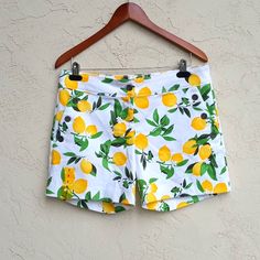 Isaac Mizrahi Tailored Shorts. Lemon Lime Scattered Prints. 2 Front Slant Pockets With Buttons Closure. 2 Faux Back Pockets. Zip And Button Closure. Extra Button. Size 8. Measurements Approximately Laid Flat (In Inches): Waist Across : 16.5" Inseam : 5" Length : 14.5" Leg Opening : 11" 66% Cotton. 32% Polyester. 2% Spandex. Machine Washable. New Without Tag (Nwot). Please See Photos For Details And Condition. Fitted Bottoms With Lemon Print For Spring, Yellow Lemon Print Bottoms For Summer, Fitted Yellow Shorts With Pockets, Yellow Fitted Summer Shorts, Yellow Lemon Print Summer Bottoms, Casual Bottoms With Lemon Print For Spring, Casual Lemon Print Bottoms For Spring, Tailored Shorts, Isaac Mizrahi