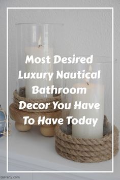 two candles sitting on top of a white mantle with rope wrapped around it and the words most desired luxury nautical bathroom decor you have to have today