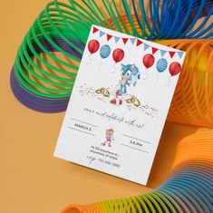 a birthday card with an image of sonic the hedgehog on it next to colorful streamers